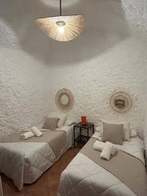 Cama o camas de una habitación en Bike Cueva - Desierto