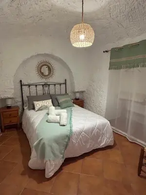 Cama o camas de una habitación en Bike Cueva - Badlands