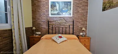 Cama o camas de una habitación en Apartamentos Wily y Mavi