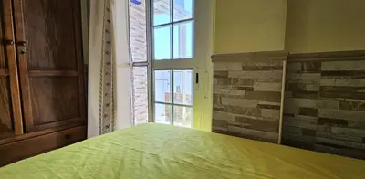 Cama o camas de una habitación en Apartamentos Wily y Mavi