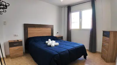 Cama o camas de una habitación en Apartalux Star Magic II