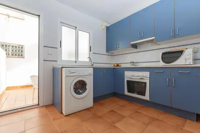 Una cocina o zona de cocina en Casa Adosada La Isleta