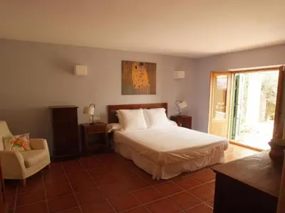 Cama o camas de una habitación en Holiday Home Schöne Villa für 6 Personen mit Schwimmbad by Interhome