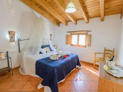 Cama o camas de una habitación en Holiday Home Ländliches Haus El Tenguerengue by Interhome