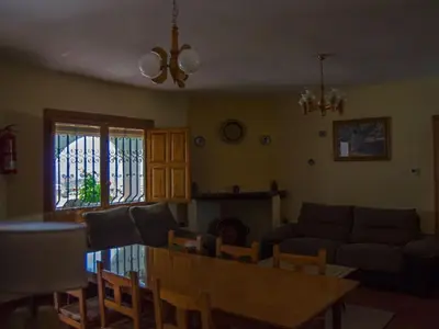 Zona de estar de Holiday Home Gemütliches Haus in Anlage mit Schwimmbad in Válor by Interhome
