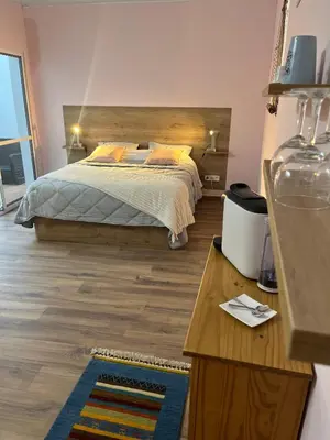 Cama o camas de una habitación en La Casa del Tiempo Recuperado