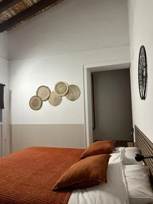 Cama o camas de una habitación en La Casa del Tiempo Recuperado