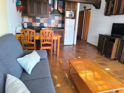 Una cocina o zona de cocina en Apartamento con terraza