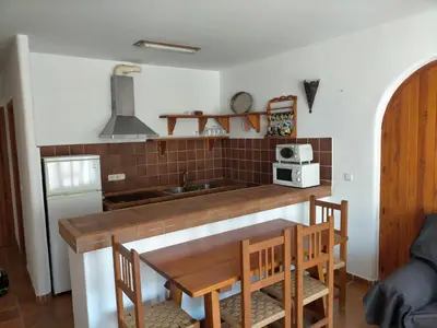 Una cocina o zona de cocina en Apartamento con terraza