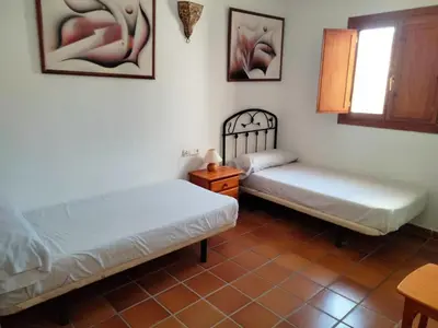Cama o camas de una habitación en Apartamento con terraza