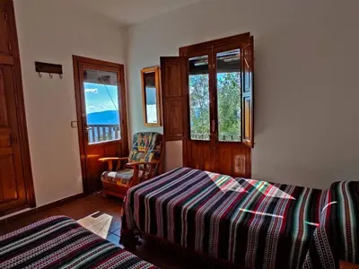 Cama o camas de una habitación en Holiday Home Gemütliches Haus mit toller Aussicht by Interhome