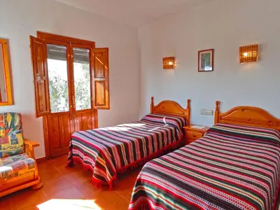 Cama o camas de una habitación en Holiday Home Gemütliches Haus mit toller Aussicht by Interhome
