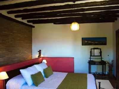 Cama o camas de una habitación en Holiday Home Gemütliches Haus in Anlage mit Pool und Garten by Interhome