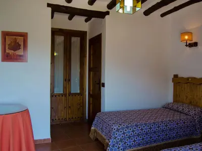 Cama o camas de una habitación en Holiday Home Gemütliches Haus in einer Anlage mit Garten und Schwimmbad- by Interhome
