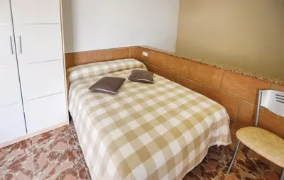 Cama o camas de una habitación en Estudio Estrella