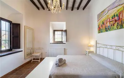 Cama o camas de una habitación en Cortijo Rural Doña Adela