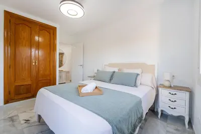 Cama o camas de una habitación en Apartamento isabel golf center