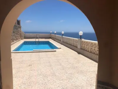 Piscina en o cerca de Beautiful villa with 280-degree sea views