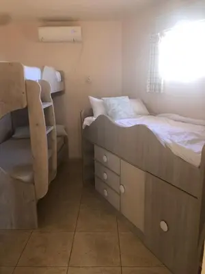 Cama o camas de una habitación en Beautiful villa with 280-degree sea views
