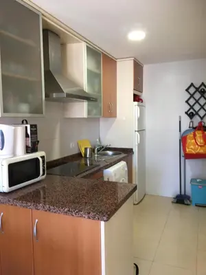 Una cocina o zona de cocina en Apartamento Paraiso Vera Playa, Aticode 2 dormitorios con piscina privada en solárium y barbacoa, WIFI - Penthouse with private pool terrace, sea view