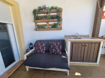 Zona de estar de Atico centrico con terraza vistas mar y montaña