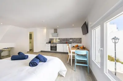 Cama o camas de una habitación en AlmeriaSuite Serenity Stay
