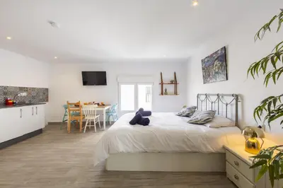 Cama o camas de una habitación en AlmeriaSuite Serenity Stay