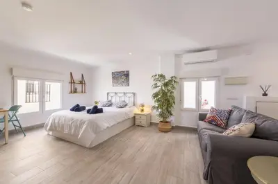 Cama o camas de una habitación en AlmeriaSuite Serenity Stay