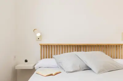 Cama o camas de una habitación en Gran Capitán- Casa en el centro con 3 habitaciones y terraza