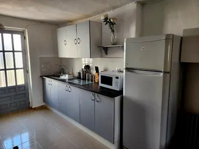 Una cocina o zona de cocina en Secluded Andalusian Casitas with Private Pool