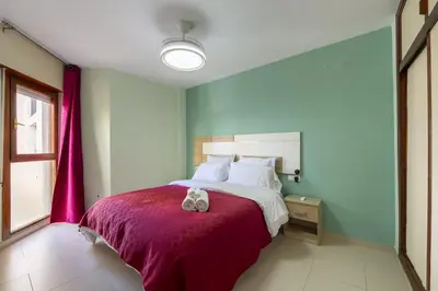 Cama o camas de una habitación en AlmeriaSuite Aguadulce Serenity Stay