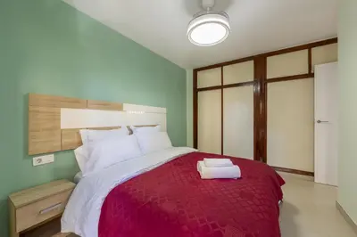 Cama o camas de una habitación en AlmeriaSuite Aguadulce Serenity Stay