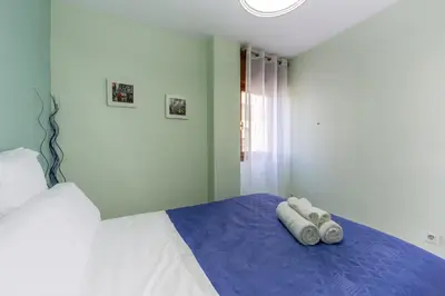 Cama o camas de una habitación en AlmeriaSuite Aguadulce Serenity Stay