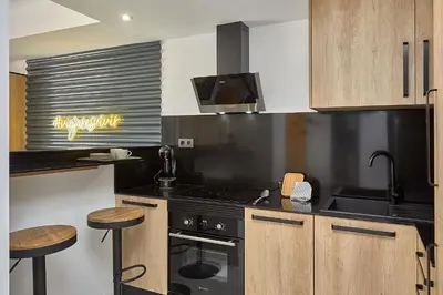 Una cocina o zona de cocina en Apartamentos Paseo Maritimo by Expoholidays 5 y 9