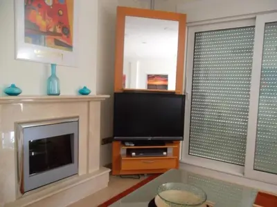 Una televisión o centro de entretenimiento en Apartment Cielo en Oasis by Interhome