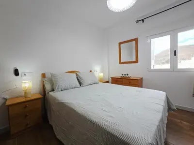 Cama o camas de una habitación en La Artesana Níjar