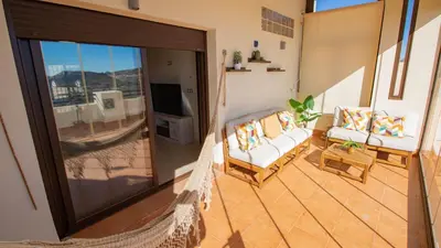 Una televisión o centro de entretenimiento en Terreros Eden Retreat