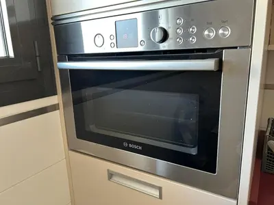 Una cocina o zona de cocina en Romanilla Suites con vistas al mar, piscina y salida directa a la playa
