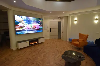 Una televisión o centro de entretenimiento en Resort Villa Las Palmeras