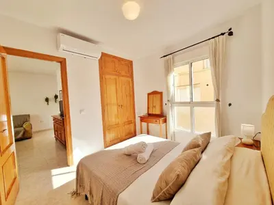 Cama o camas de una habitación en SOL, PLAYA y MAR III Cabo de Gata Almería
