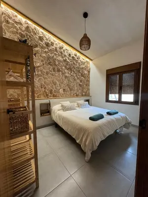 Cama o camas de una habitación en Villa Loma de Bas 1 y 2