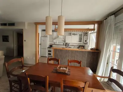 Una cocina o zona de cocina en Apartamento coqueto con terraza junto al mar