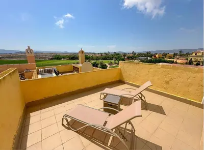Un balcón o terraza de Desert Springs Resort Golf y piscina duplex exclusivo