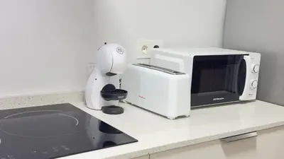 Una cocina o zona de cocina en Puerta del Mar 2