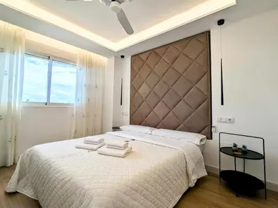 Cama o camas de una habitación en Casa Varykino - Terraza con Vistas al Mar - 100 Metros de la Playa