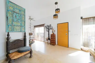 Una televisión o centro de entretenimiento en Villa Las Puertas