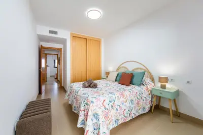 Cama o camas de una habitación en Bomboncito Beach