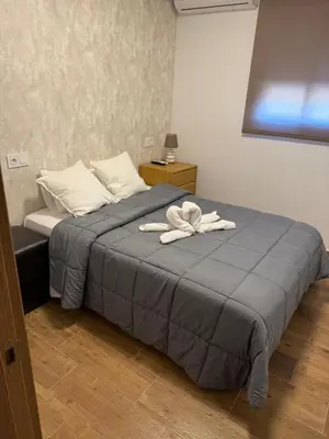 Cama o camas de una habitación en Hotel Mesón el 21
