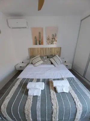 Cama o camas de una habitación en Ancla del mar 1ª línea playa en San José