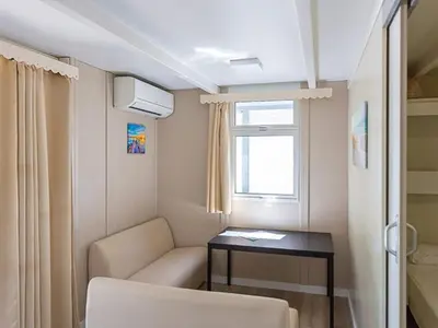 Zona de estar de Charmant Bungalow 5 Pers Avec Terrasse - API-1-52-1776